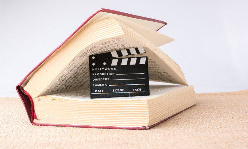filmy na podstawie książek klaps filmowy wewnątrz książki